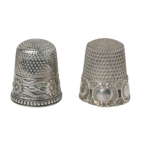 49 - Two American Sterling Silver Thimbles.
1 - Daisy decoration border. Marked sterling, 9 and, in the d... 