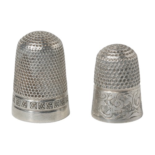 59 - Two Chester Sterling Silver Thimbles:
1 - GW Harvey & Co. Chester 1903. Punched dome with decorated ... 