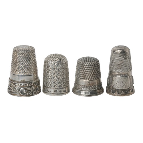 60 - Collection of Four Thimbles:
1 - No marks. Punched dome with decorated band at base.  Initials EG on... 