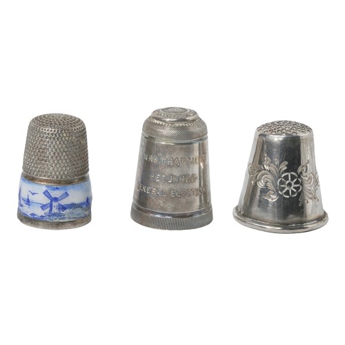 75 - Collection of Three Interesting Thimbles
1 - Dutch-style with blue and white enamel band with figure... 