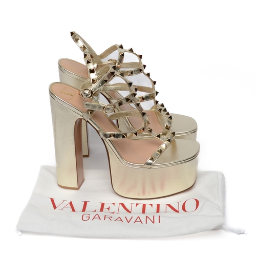 211 - Valentino Garavani Gold Platform Studded Heels. Size 40. Pre-loved with some light scuffs to heels a... 