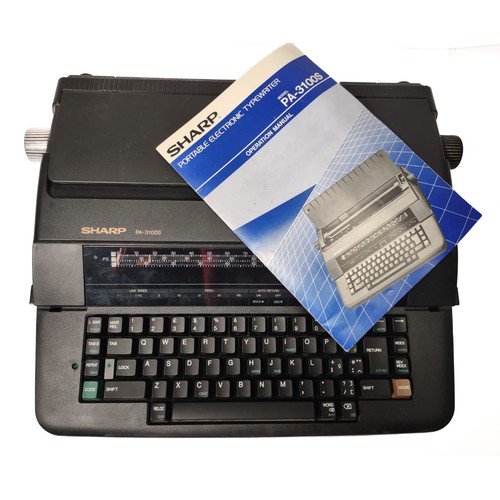 57 - Sharp Portable Electronic Typewriter PA-3100S - with original cover and instruction manual. Untested... 