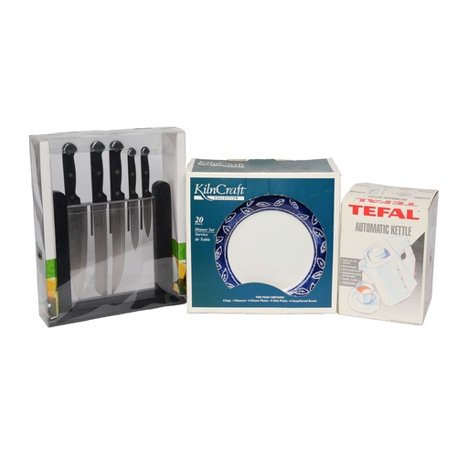 29 - Kitchen Bundle including:
Set of 5 Swan Knives
Kilncraft 20 piece dinner service
Tefal kettle
All bo... 