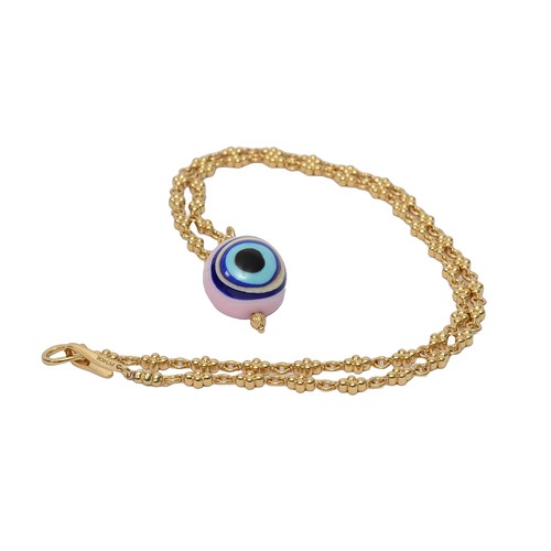 172 - Tohum Eye Necklace. Decorative eye charm on long gold-coloured chain.