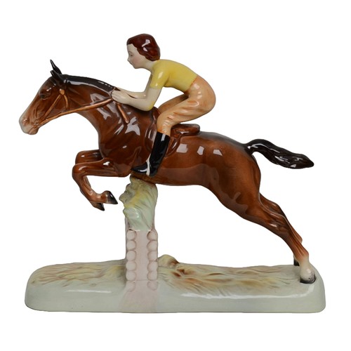 4 - Beswick - Girl on Jumping Horse. Damage to one ear.