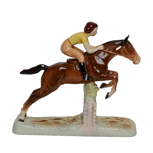 4 - Beswick - Girl on Jumping Horse. Damage to one ear.