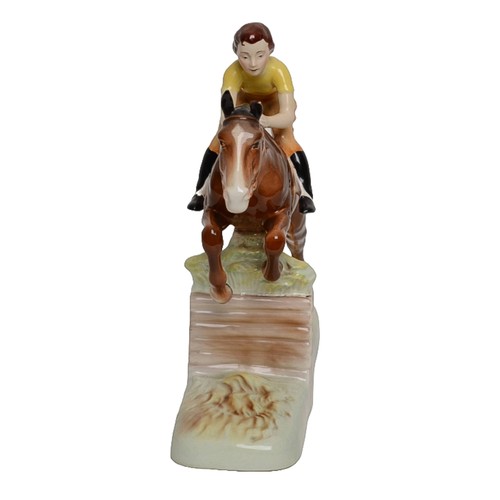 4 - Beswick - Girl on Jumping Horse. Damage to one ear.