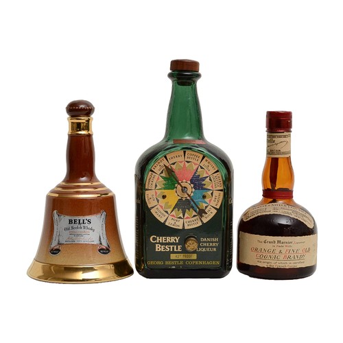 77 - Trio of Vintage Spirit Bottles: Grand Marnier, Cherry Bestle and Bell's Decanter.