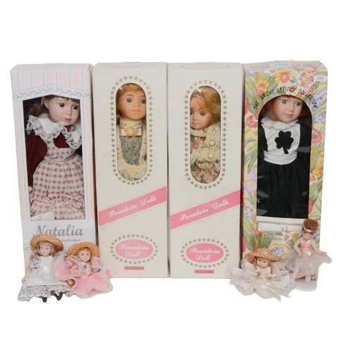 14 - Collection of Porcelain Dolls. Includes:
- Collector's Choice Fine Bisque Porcelain. Boxed.
- The Kn... 