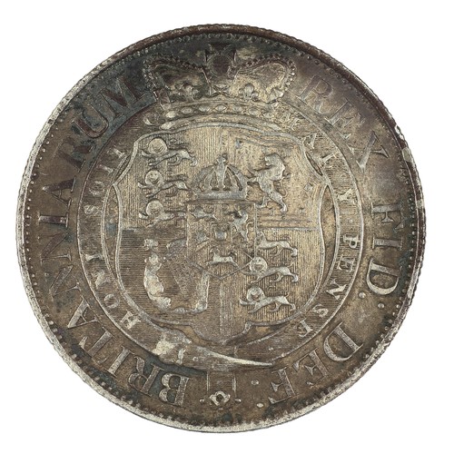 58 - George III, Half Crown. 1818.  Some dark tones and a darker patch on reverse and a scratch on cheekb... 