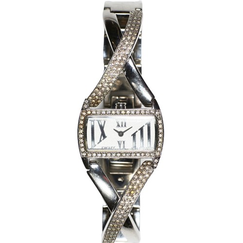 105 - DKNY Ladies Twist Bangle Watch. Stainless steel and crystal embellishment.