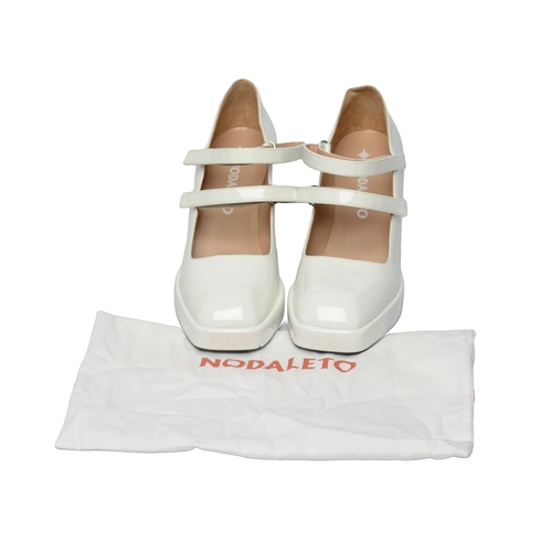 122 - Nodaleto Bulla Babies glossed-leather platform Mary Jane pumps. White, size 40. Some light use but g... 