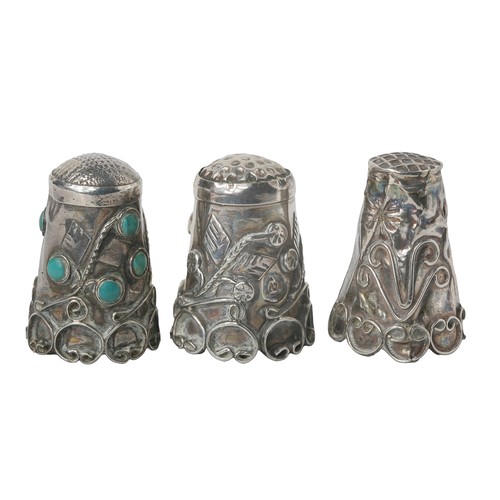 102 - Collection of 3 Mexican Ornate Silver Thimbles
1 with turquoise stones added
All with beautiful appl... 