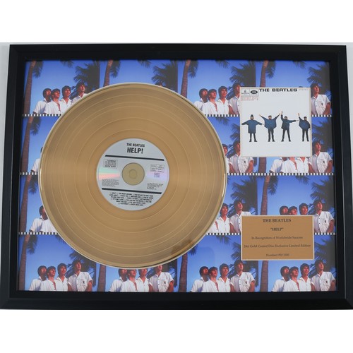 79 - The Beatles - Help! Gold Disc

Limited edition CD mounted on a 24ct gold coated disc.

Number 150/15... 