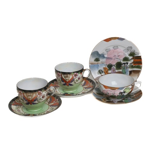 45 - Three Japanese Cups and Saucers, one set with matching tea plate. 
Matching pair of cups are stamped... 