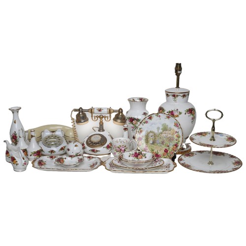 48 - Quantity of Royal Albert Ornaments including two telephones, a table lamp (untested), a vase and oth... 