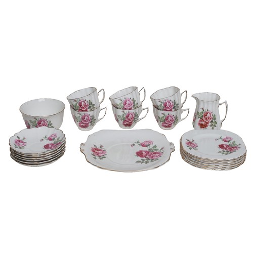 23 - Bone China Vintage Tea Set. White with rose pattern. 21 pieces.