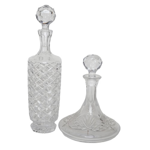 27 - Two Glass Decanters with Stoppers:
1 x ships decanter
1 x tall spirit decanter