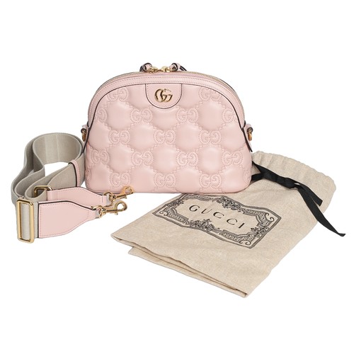 62 - Gucci Shoulder Bag. Pink with neutral canvas strap. Excellent condition with no marks to inside lini... 