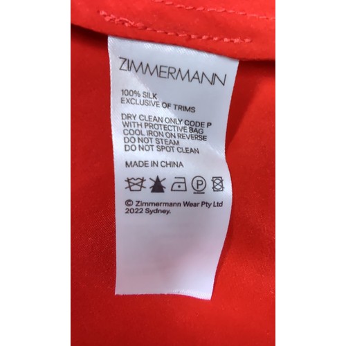 57 - Zimmermann Red 100% Silk Mini Wrap Dress. Long-sleeved with zip cuffs at wrists. No size label but a... 