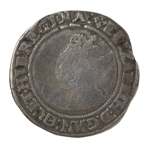 13 - Elizabeth I, 1560-61, Shilling. MM Cross Crosslet. Portrait Very Good, rim and reverse fine with wor... 