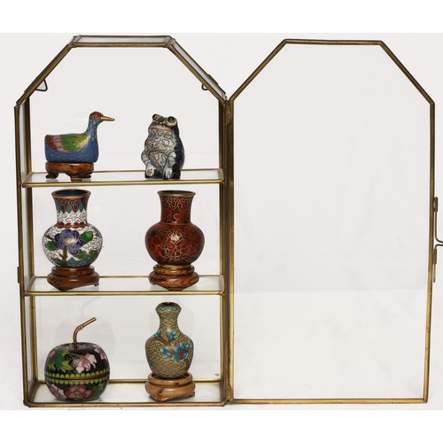 50 - Collection of Six Cloisonne Miniatures. Including 3 vases, 1 duck, 1 frog and an apple, in glass dis... 