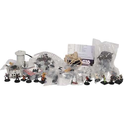 147 - Star Wars Miniature Lot 2007. Includes approx 51 cards and 42 miniatures, many of which are still se... 