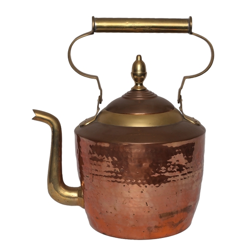 88 - Large Copper and Brass Kettle. Approximately 38cm high with handle extended.