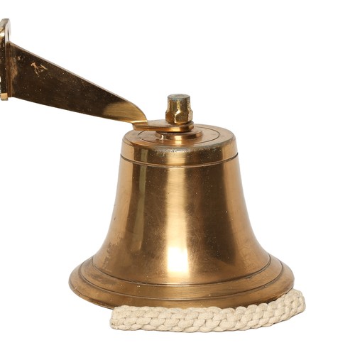 24 - Heavy Wall-Mountable Brass Bell. Approx 14cm high and 19cm in diameter.