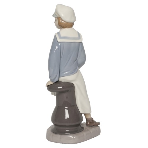 29 - Lladro Boy with Yacht. No. 4810. In original box. In perfect condition with no signs of any damage.