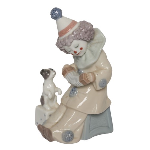 37 - Lladro Pierrot with Concertina. 5279. In original box. Perfect condition with no visible signs of da... 