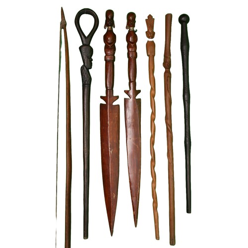 81 - Collection of 6 African Tribal Walking Sticks, Paddles (?) and a Rustic Wooden Bow.
Collection only ... 