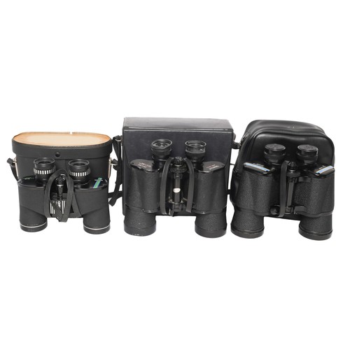 124 - 3 Pairs of Binoculars. Includes:
Tasco 16x50 - appear to be in good condition. In case.
Tasco 20x50 ... 