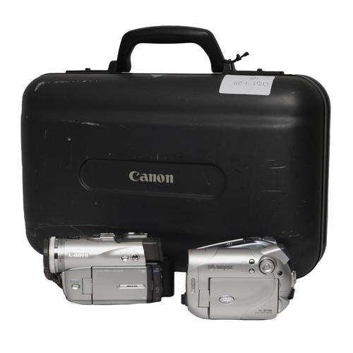 129 - Two Canon Digital Camcorders. Untested. Includes:
Canon DC 100 - with power adapter, battery, variou... 