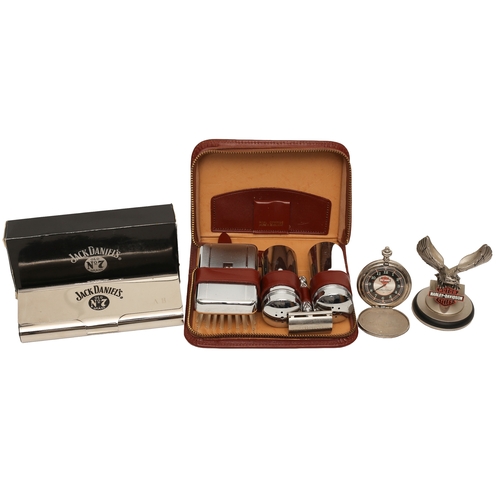 111 - Mixed Gents Lot including:
Jack Daniels Glasses Case
Harley Davidson Eagle and Pocketwatch (requirin... 