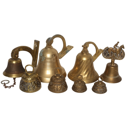 32 - Collection of Brass Bells including a set of 4 matching.