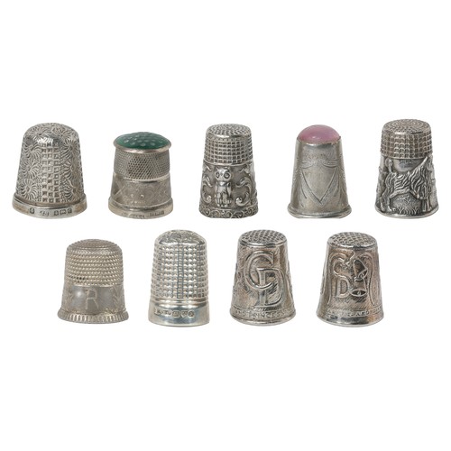 62 - Collection of Silver and Metal Thimbles including:
1. Marked as sterling silver and embossed with a ... 