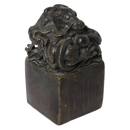 117 - Bronzed Chinese Dragon Seal. Approx. 12cm tall by 6cm wide.