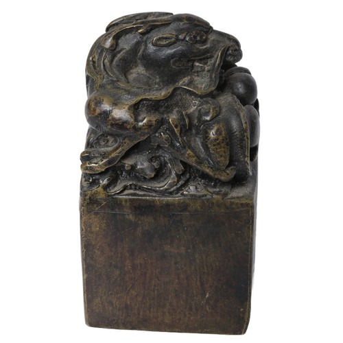 117 - Bronzed Chinese Dragon Seal. Approx. 12cm tall by 6cm wide.