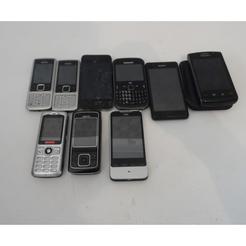 201 - 11 RETRO MOBILE PHONES 
1x Blackberry with cover, 1 x iPhone (cracked screen), 3 x Samsung (one with... 
