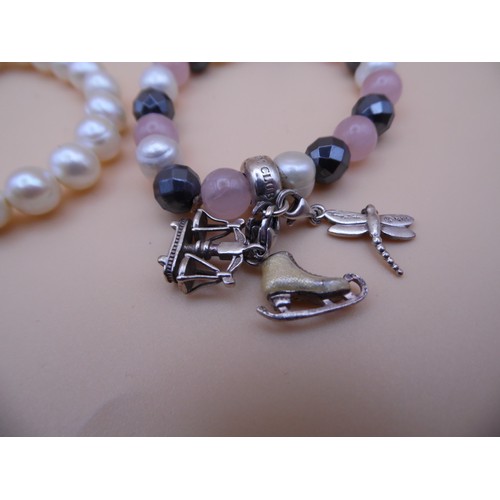 42 - 3 Thomas Sabo 925 silver marked bracelet with charms.