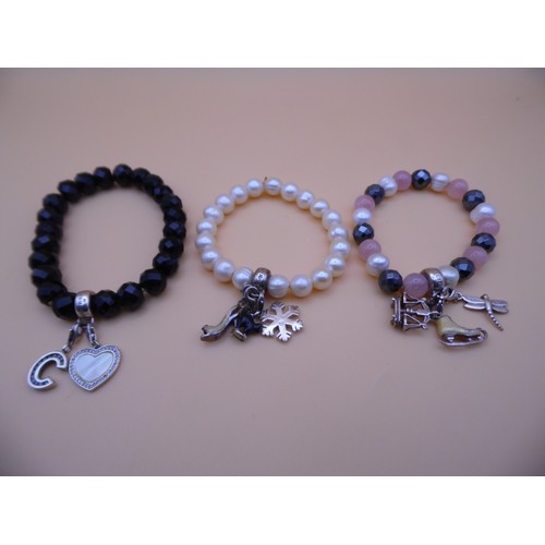 42 - 3 Thomas Sabo 925 silver marked bracelet with charms.