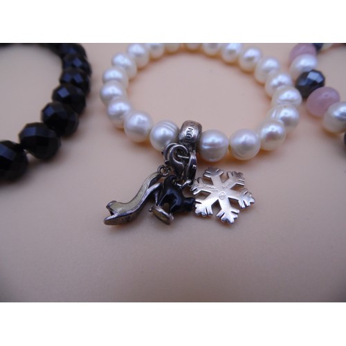 42 - 3 Thomas Sabo 925 silver marked bracelet with charms.