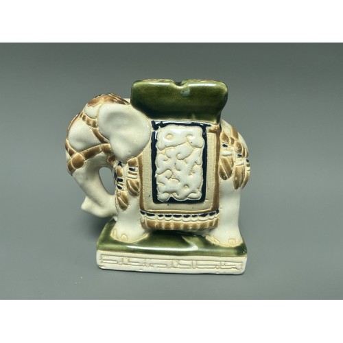 8 - Small Vintage Ceramic Elephant Figure Ashtray Holder. A ceramic elephant figure/holder, decorated in... 