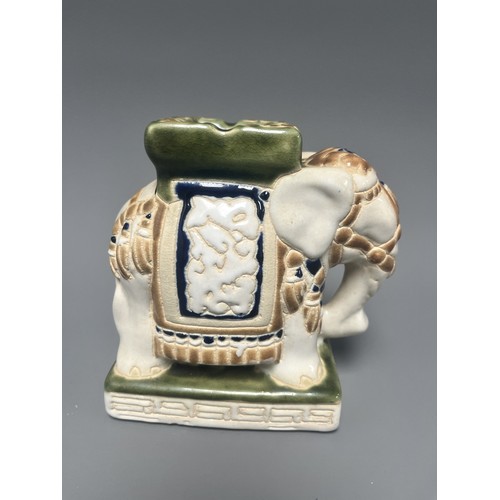 8 - Small Vintage Ceramic Elephant Figure Ashtray Holder. A ceramic elephant figure/holder, decorated in... 