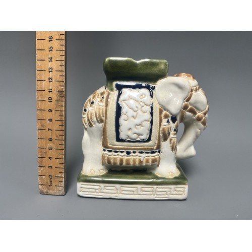 8 - Small Vintage Ceramic Elephant Figure Ashtray Holder. A ceramic elephant figure/holder, decorated in... 
