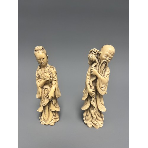 10 - A Pair of Creamy-White Carved Figurines Male and Female. A pair of creamy-white carved figurines, de... 