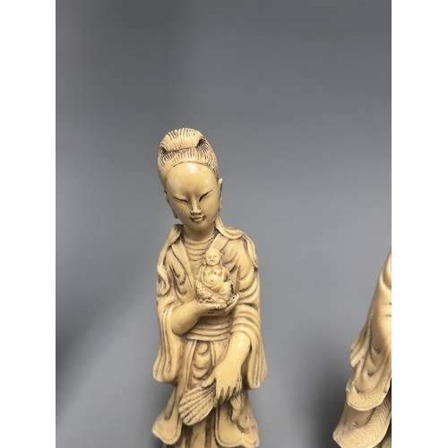 10 - A Pair of Creamy-White Carved Figurines Male and Female. A pair of creamy-white carved figurines, de... 