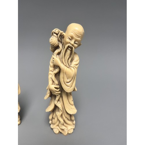 10 - A Pair of Creamy-White Carved Figurines Male and Female. A pair of creamy-white carved figurines, de... 