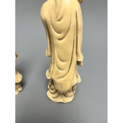 10 - A Pair of Creamy-White Carved Figurines Male and Female. A pair of creamy-white carved figurines, de... 